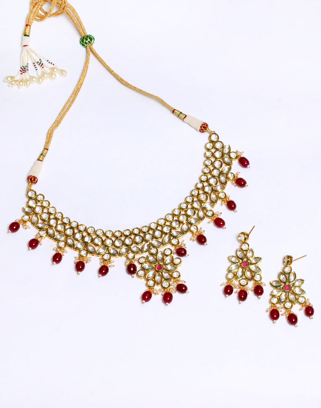 Elegant Gold Toned Kundan Set With Ruby Stone