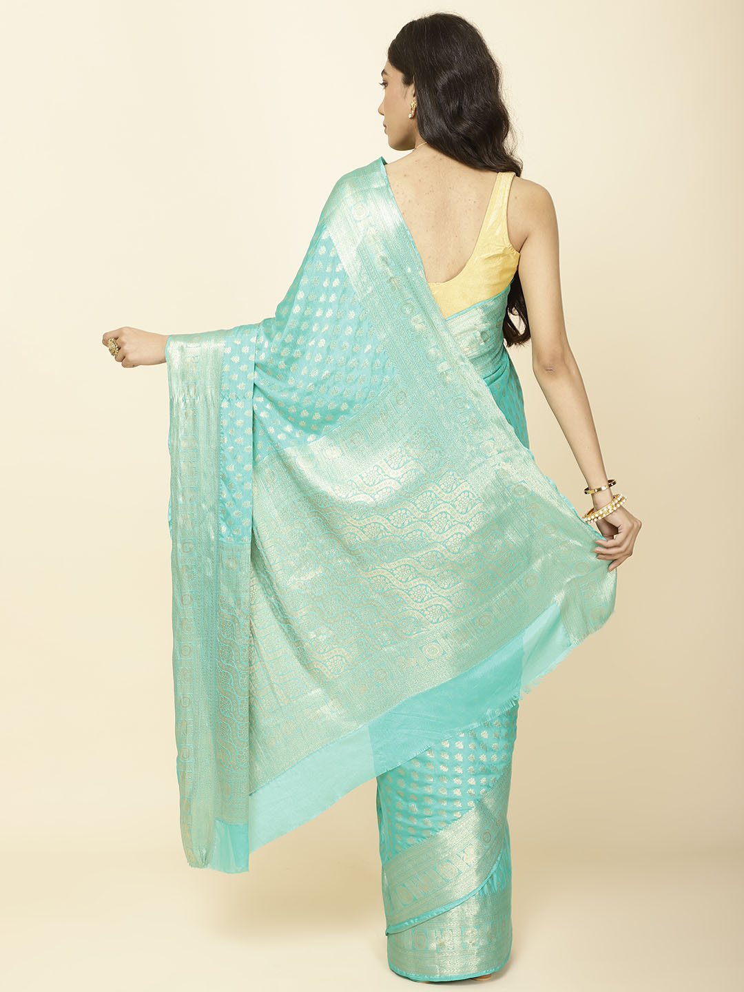 Zari Border Booti Plain Crepe Saree