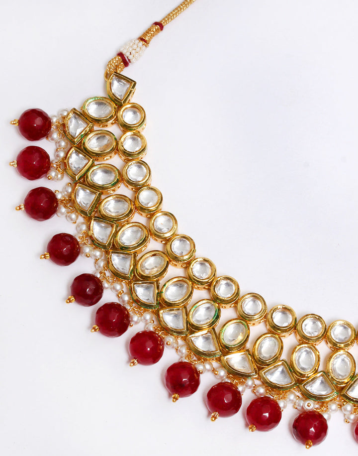 Elegant Gold Toned Kundan With Maroon Stone Necklace Set