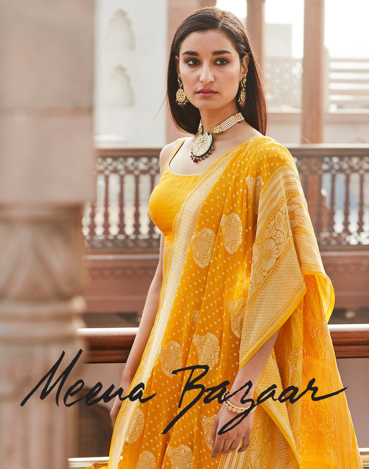 Yellow colour woven saree on georgette fabric
