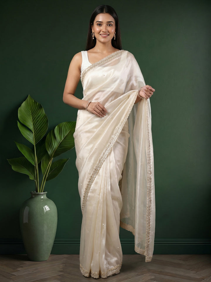 Cream Embroidered Tissue Saree